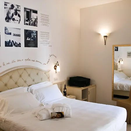 Sovrana & Отель